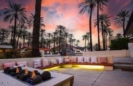 view of patio terrace at dusk