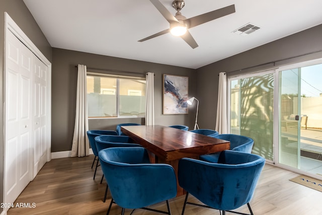 dining area with hardwood / wood-style flooring, plenty of natural light, and ceiling fan