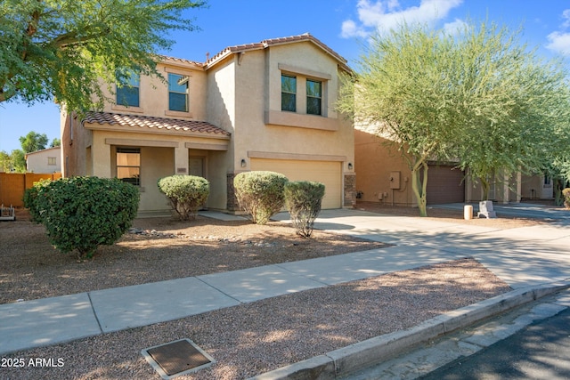 view of front of property with a garage