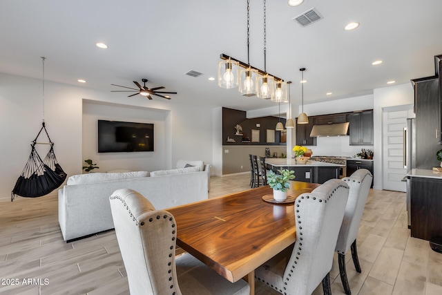 7694 W Desert Spoon Dr, Peoria, AZ 85383 - dining room featuring light wood-type flooring, recessed lighting, baseboards, and ceiling fan