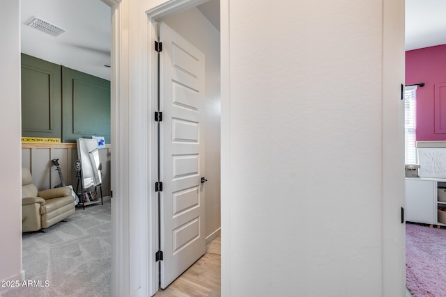 7694 W Desert Spoon Dr, Peoria, AZ 85383 - hallway featuring light colored carpet