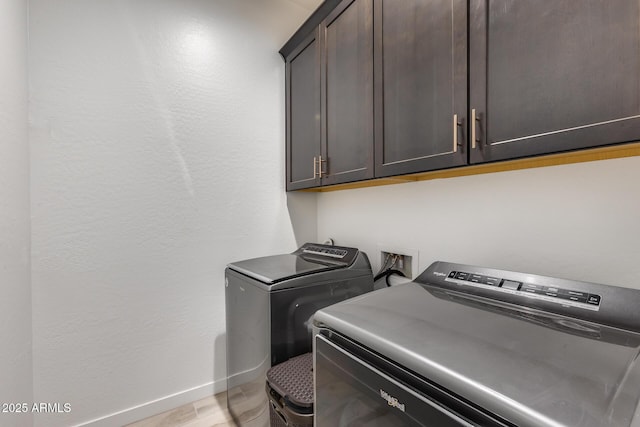 7694 W Desert Spoon Dr, Peoria, AZ 85383 - laundry area featuring cabinet space, independent washer and dryer, and baseboards