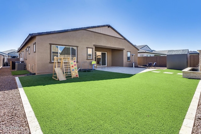 7694 W Desert Spoon Dr, Peoria, AZ 85383 - rear view of house featuring cooling unit, a patio, and stucco siding
