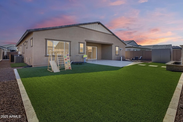 7694 W Desert Spoon Dr, Peoria, AZ 85383 - rear view of house featuring cooling unit, a patio, and stucco siding