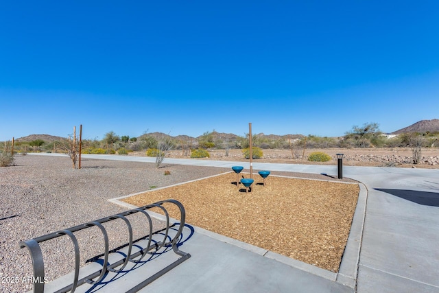 7694 W Desert Spoon Dr, Peoria, AZ 85383 - view of yard with a mountain view