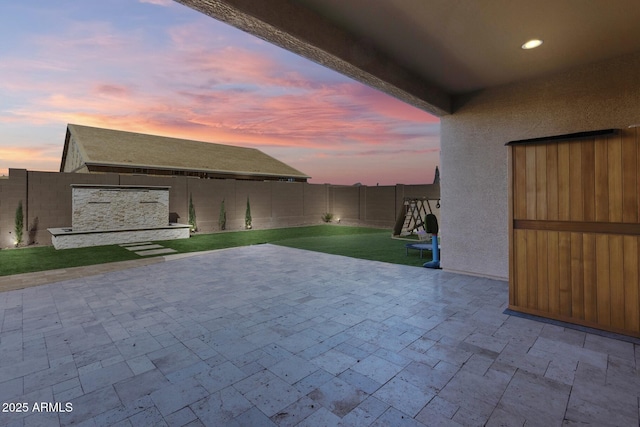 7694 W Desert Spoon Dr, Peoria, AZ 85383 - fenced backyard featuring a patio area
