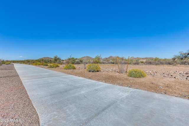 7694 W Desert Spoon Dr, Peoria, AZ 85383 - view of road with a mountain view