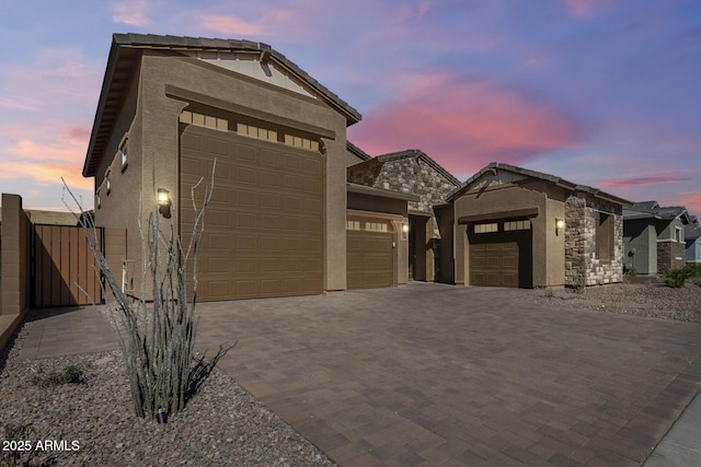 7694 W Desert Spoon Dr, Peoria, AZ 85383 - single story home with a garage, decorative driveway, and stucco siding