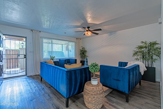 6044 W Augusta Ave, Glendale, AZ 85301 - living room featuring wood finished floors and ceiling fan