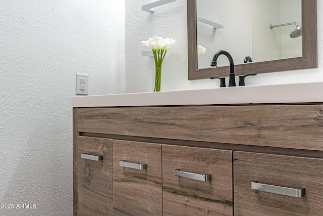 6044 W Augusta Ave, Glendale, AZ 85301 - bathroom view of vanity and a textured wall