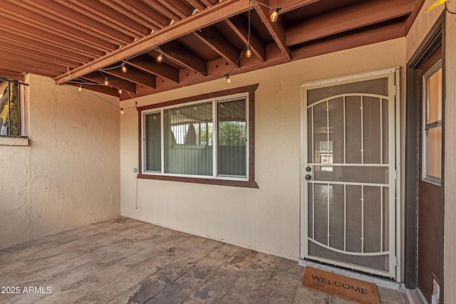 6044 W Augusta Ave, Glendale, AZ 85301 - property entrance with a patio area and stucco siding