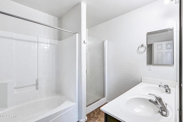 bathroom featuring tile patterned floors and vanity