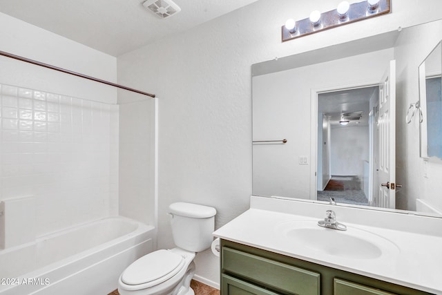 full bathroom with vanity,  shower combination, and toilet