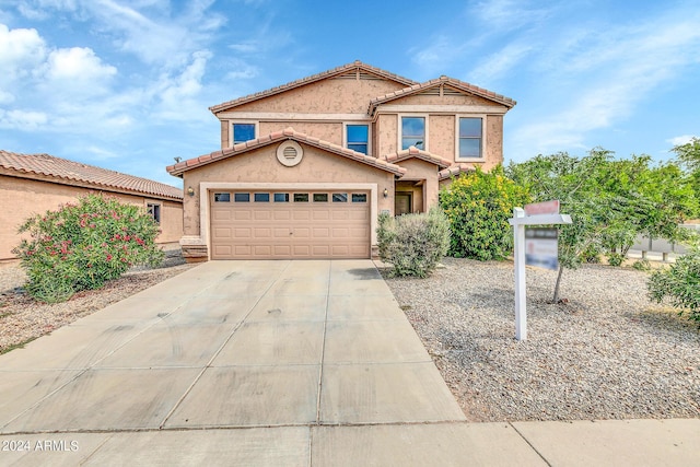 view of front of home featuring a garage