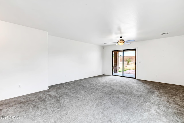 empty room with carpet and ceiling fan