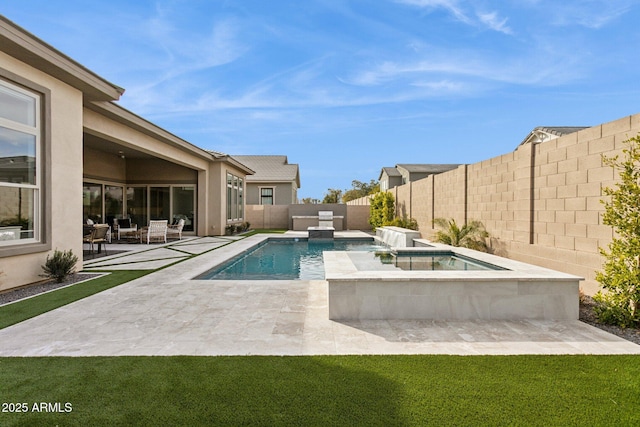 view of pool featuring an in ground hot tub, pool water feature, and a patio