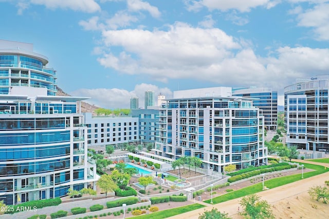view of building exterior featuring a view of city
