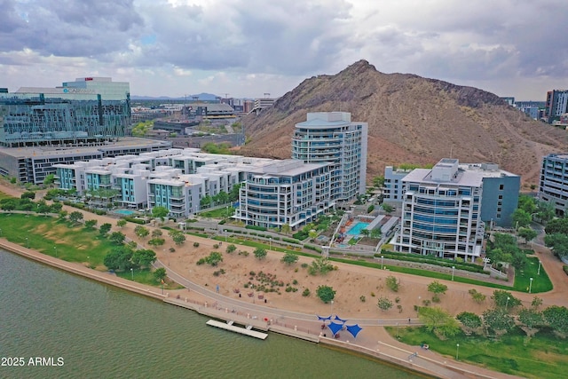 bird's eye view featuring a water and mountain view