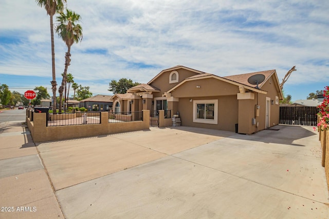 6701 W Catalina Dr, Phoenix, AZ 85033 - mediterranean / spanish-style house with fence private yard and stucco siding