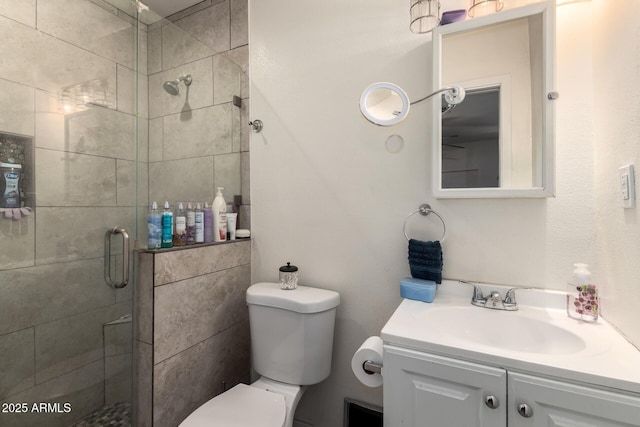 6701 W Catalina Dr, Phoenix, AZ 85033 - bathroom with vanity, a shower stall, and toilet