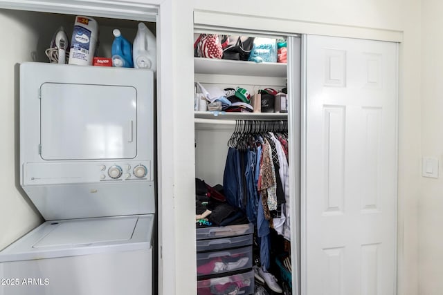 6701 W Catalina Dr, Phoenix, AZ 85033 - clothes washing area featuring stacked washing maching and dryer and laundry area