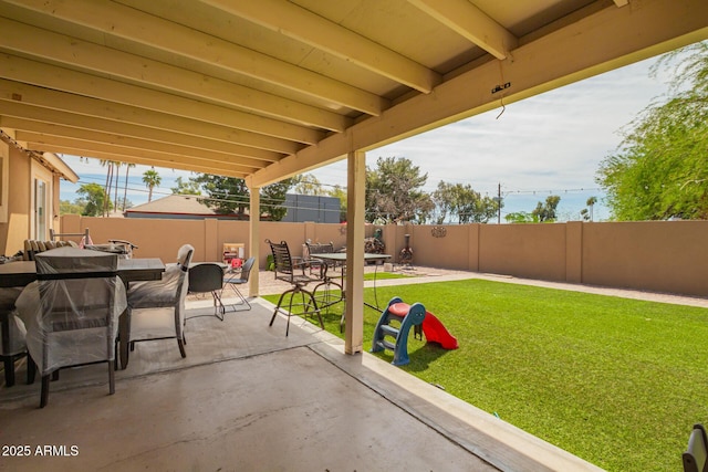 6701 W Catalina Dr, Phoenix, AZ 85033 - view of patio / terrace with outdoor dining area and a fenced backyard