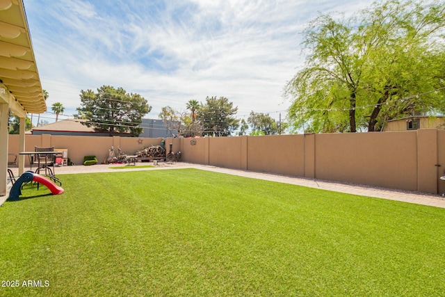 6701 W Catalina Dr, Phoenix, AZ 85033 - view of yard with a patio area and fence