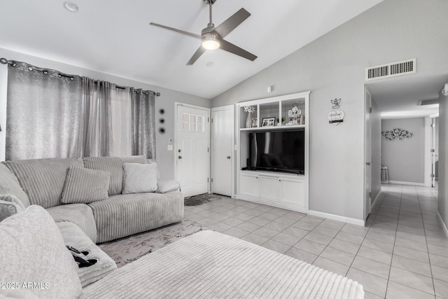 6701 W Catalina Dr, Phoenix, AZ 85033 - living area featuring a ceiling fan, visible vents, light tile patterned floors, baseboards, and lofted ceiling