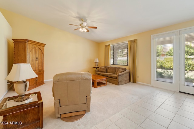 carpeted living room featuring a healthy amount of sunlight and ceiling fan