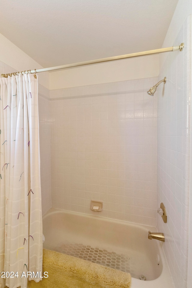 bathroom featuring shower / tub combo