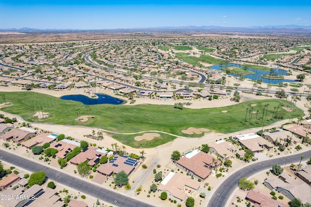 birds eye view of property with a residential view, view of golf course, and a water and mountain view