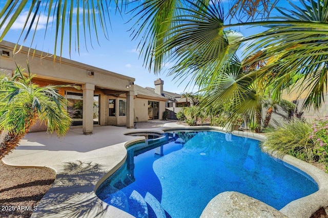 view of pool featuring a patio