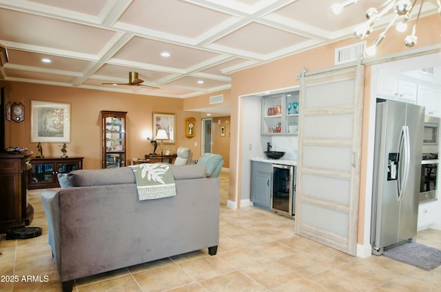 living room with beverage cooler, coffered ceiling, visible vents, and baseboards