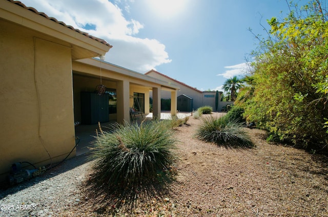 view of yard with a patio area