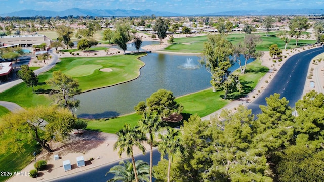 bird's eye view featuring view of golf course and a water and mountain view