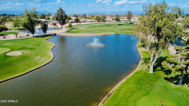 bird's eye view featuring view of golf course and a water view