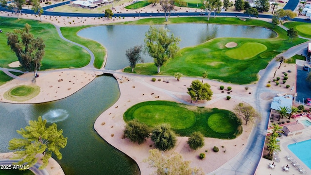 birds eye view of property featuring view of golf course and a water view