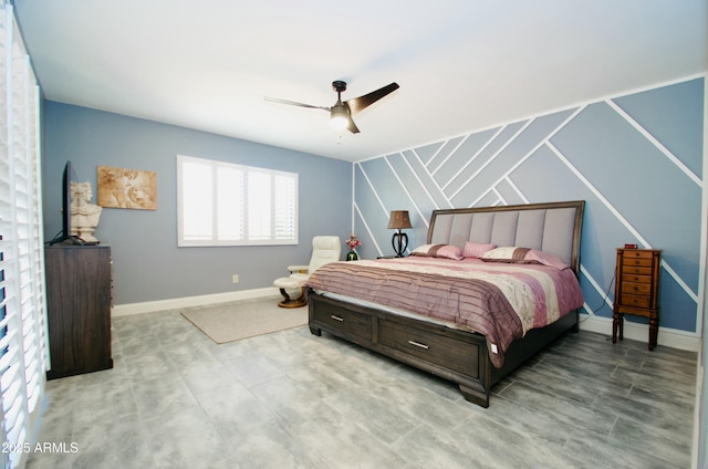 bedroom featuring baseboards and a ceiling fan