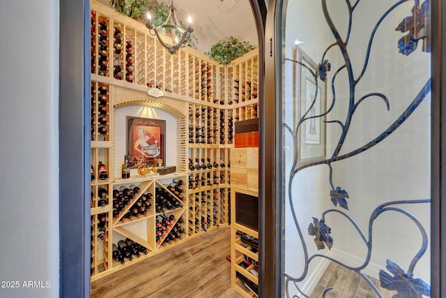 wine area featuring hardwood / wood-style flooring