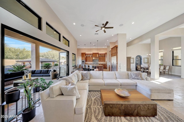 living room featuring ceiling fan