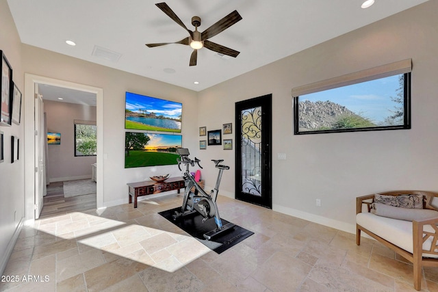 exercise area featuring ceiling fan