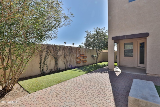 view of patio with a fenced backyard