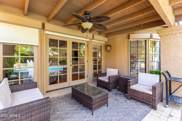 view of patio / terrace featuring french doors, ceiling fan, and an outdoor hangout area