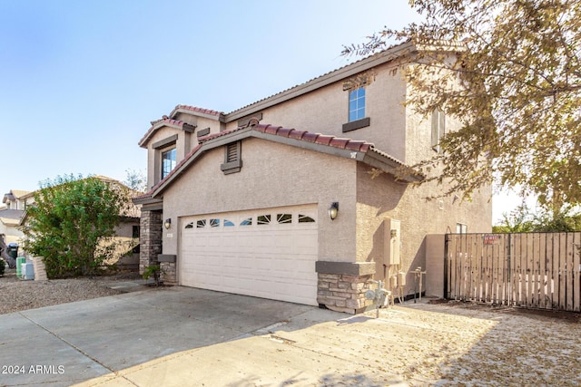 view of front of home with a garage