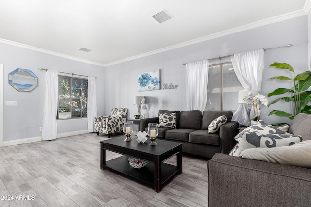 living room featuring ornamental molding and hardwood / wood-style flooring