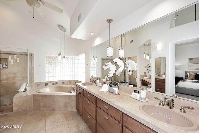 bathroom with ceiling fan, tile patterned floors, vanity, and independent shower and bath