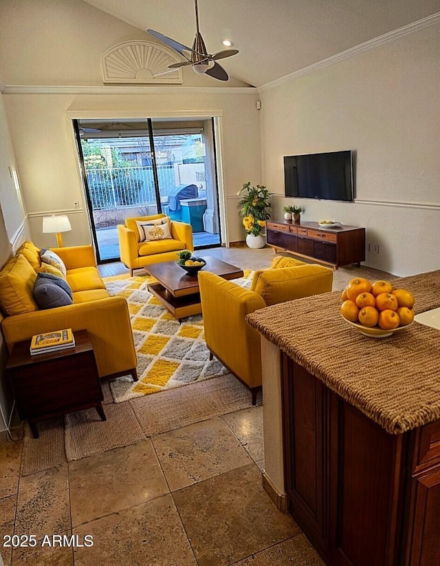 living room with crown molding, vaulted ceiling, and ceiling fan