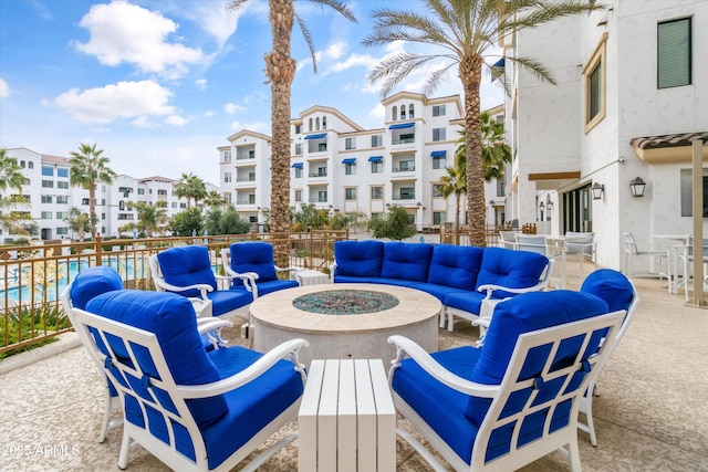 view of patio / terrace with a fire pit