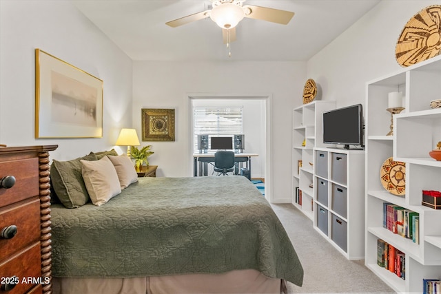 bedroom with ceiling fan and carpet