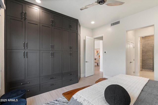 bedroom featuring a ceiling fan, baseboards, visible vents, light wood-style floors, and recessed lighting